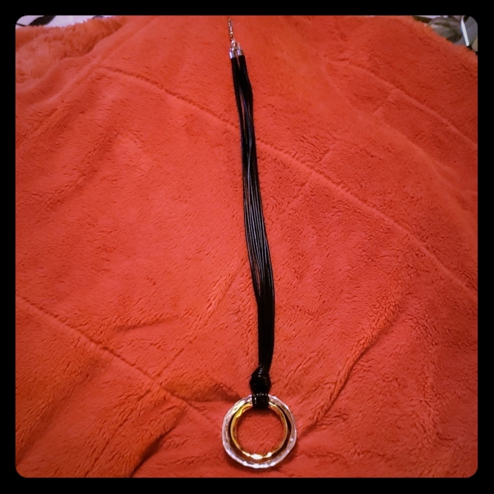 Necklace with leather neck strap